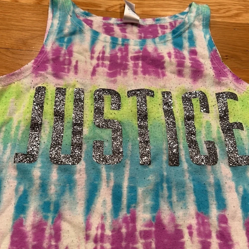 Justice size 10 girl tank top- pulling due to wash